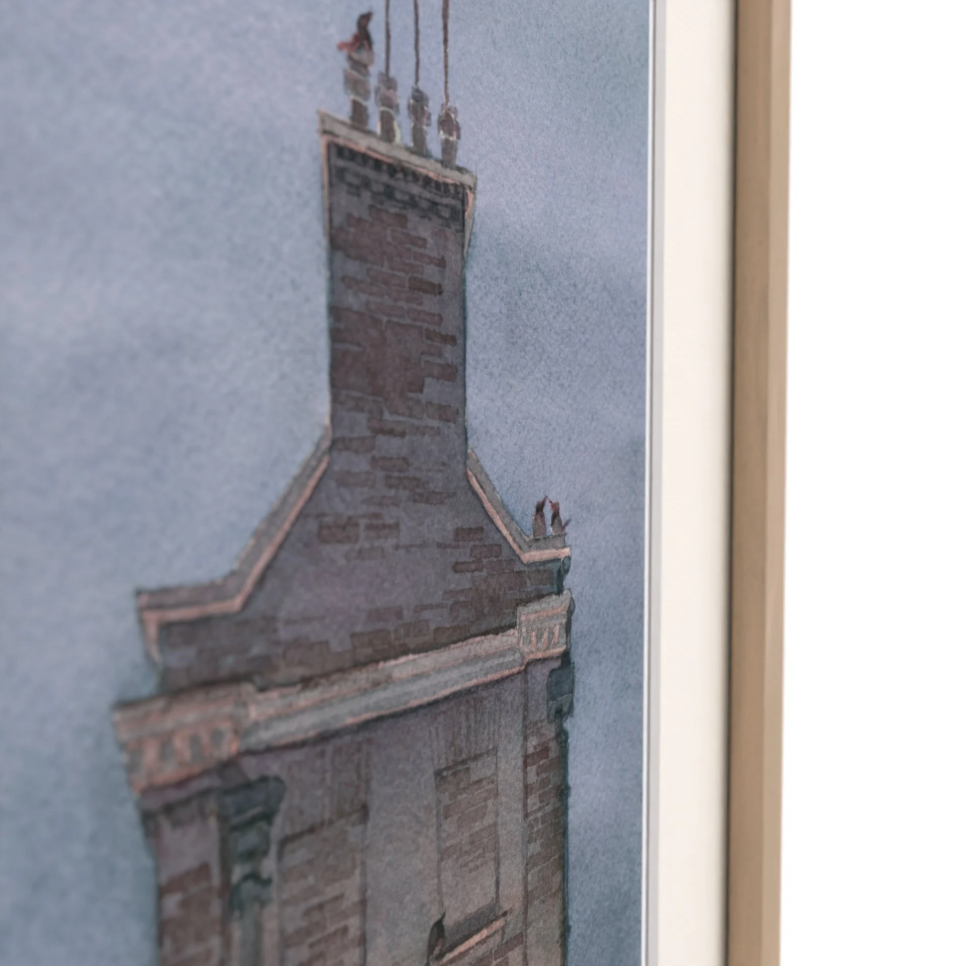 Watercolour painting showing King's Parade nr22 Cambridge University Store Ryder & Amies at Night