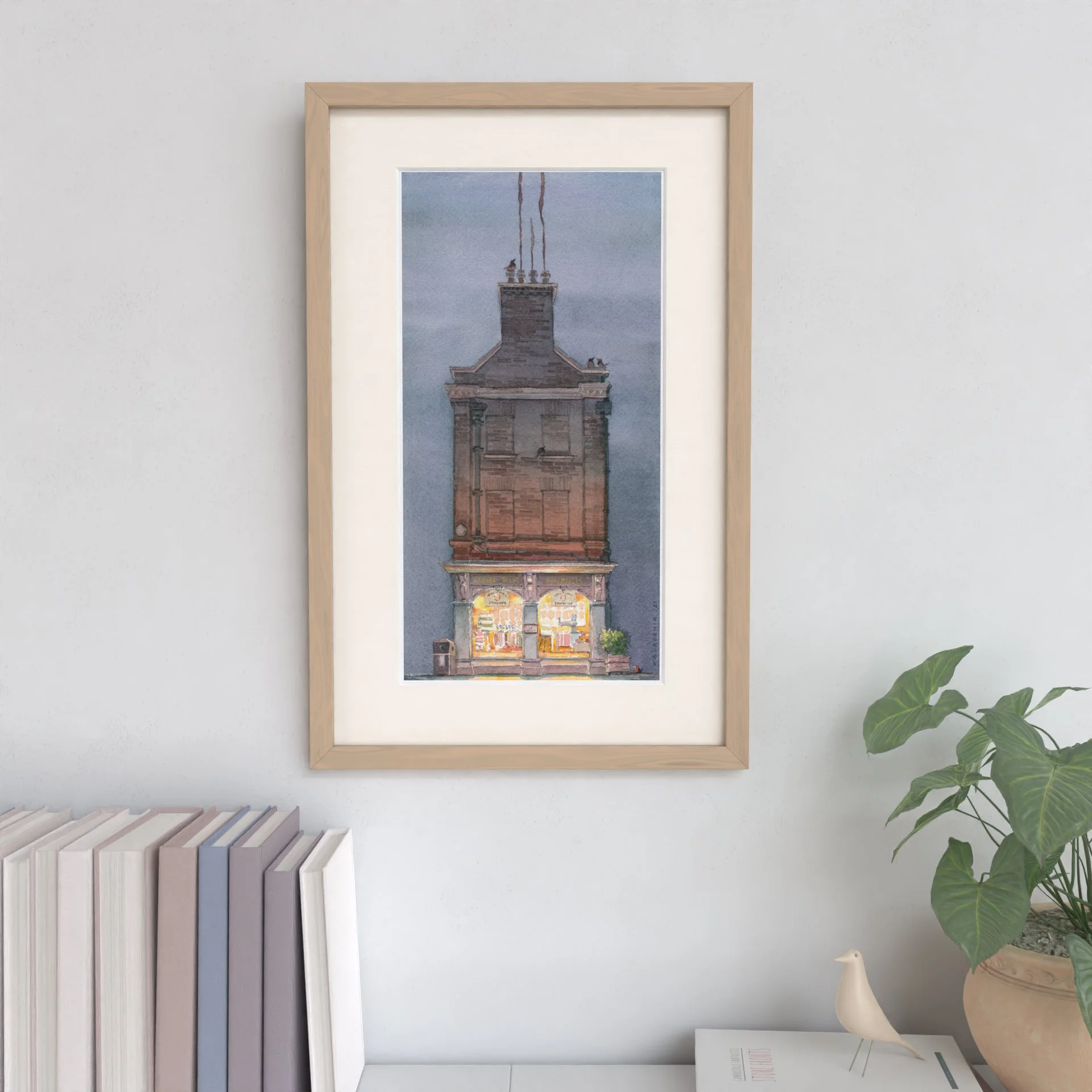 Watercolour painting showing King's Parade nr22 Cambridge University Store Ryder & Amies at Night