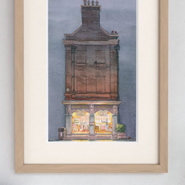 Watercolour painting showing King's Parade nr22 Cambridge University Store Ryder & Amies at Night
